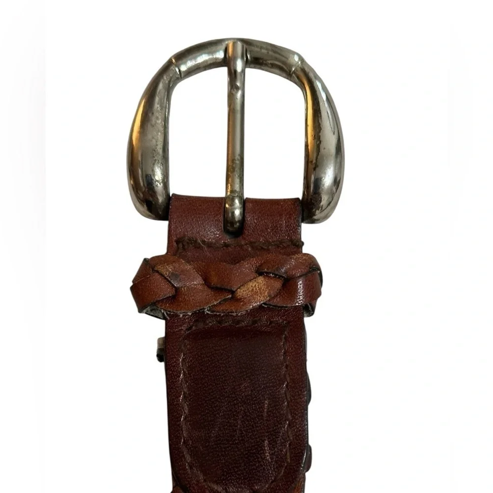 A men’s / women’s leather braided belt, Made in Uraguay. M.